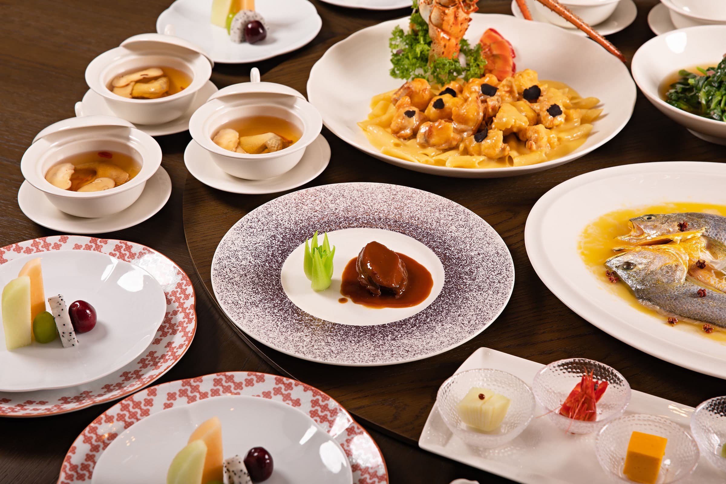A table of Chinese dishes served family-style